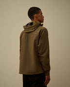 VESTE CP SHELL CAPUCHES LUNETTES